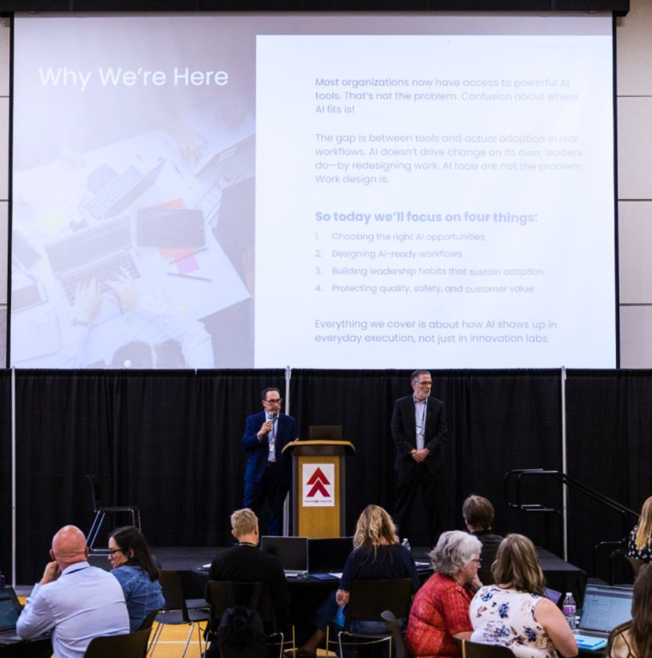 Work Excellence presenting on AI adoption and work design at the AI Leadership Summit in Janesville, Wisconsin